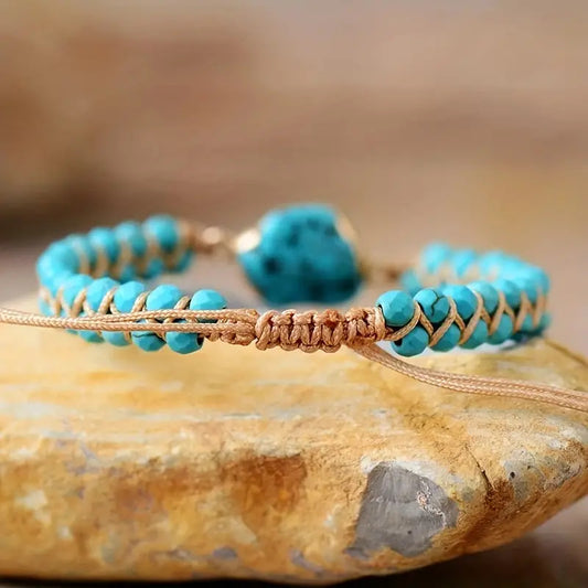 Armband met onregelmatige turquoise bezel en dubbele hanger